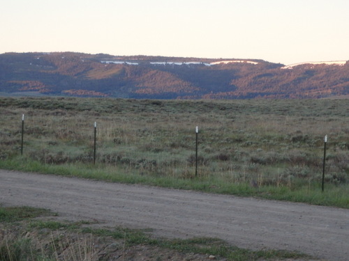 GDMBR: Dawn comes to the Lima Reservoir Wildlife Refuge and Wetland Wild Camp.